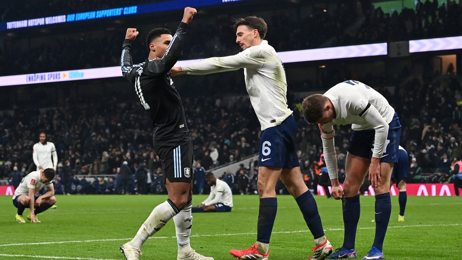 Spurs' Frank blames Watkins for melee after Cup exit