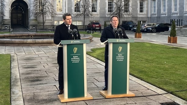 Ministers Peter Burke and Darragh O'Brien speaking at Govt Buildings