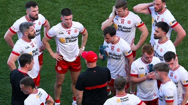  Tyrone manager Malachy O'Rourke speaks to his players at half time of the 2025 All-Ireland semi-final