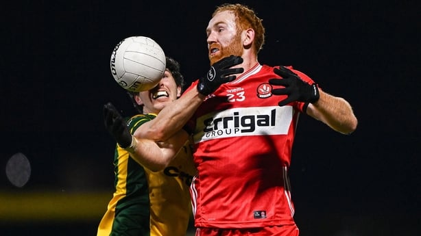 14 January 2026; Conor Glass of Derry in action against Finnbarr Roarty of Donegal during the Bank of Ireland Dr McKenna Cup semi-final match between Derry and Donegal at Celtic Park in Derry. Photo by Ben McShane/Sportsfile