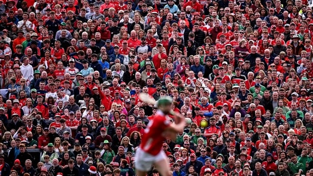 7 June 2025; A general view of spectators as Séamus Harnedy of Cork makes a pass during the Munster GAA Hurling Senior Championship final match between Limerick and Cork at TUS Gaelic Grounds in Limerick. Photo by Piaras Ó Mídheach/Sportsfile