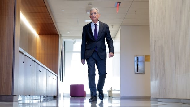 WASHINGTON, DC - JANUARY 13: Federal Reserve Chairman Jerome Powell walks between meetings at the Fed on January 13, 2026 in Washington, DC. The U.S. Justice Department announced that it is opening a criminal investigation of Powell, who later said, 