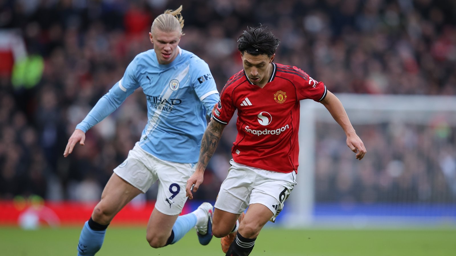 Martinez unruffled by Scholes digs after derby delight