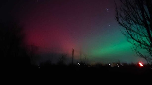 a view of the northern lights over kinvara