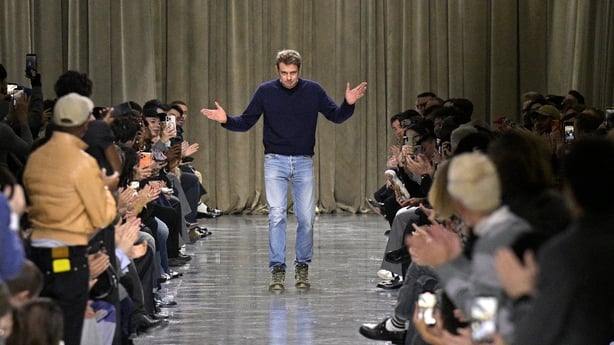 Fashion designer Jonathan Anderson acknowledges the applause of the audience during the Dior Homme Menswear Fall/Winter 2026-2027