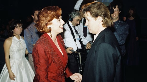 Johnny Logan congratulates Niamh Kavanagh following her win at the Eurovision Song Contest in 1993