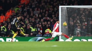 Matheus Cunha of Manchester United scores his team's third goal during the Premier League match between Arsenal and Manchester United at Emirates Stadium on January 25, 2026 in London, England.