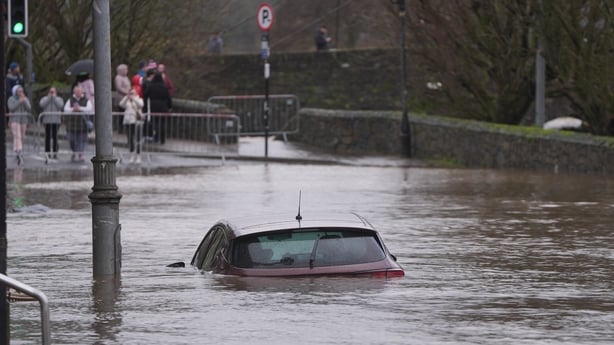 A car is engulfed in floodwater in Enniscorthy 