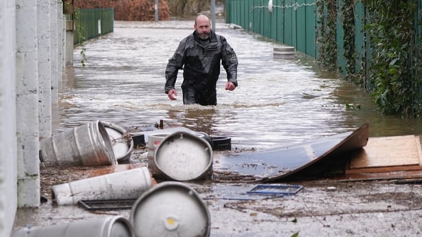  members of Slaney Search and Rescue working in floodwater in Enniscorthy