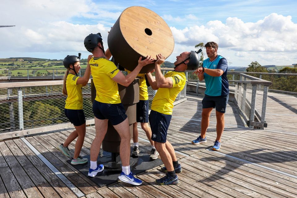 Former Irish rugby player Donncha O'Callaghan putting a family through their paces at the grand final of Ireland’s Fittest Family, hosted by Treetop Walk Avondale in December.