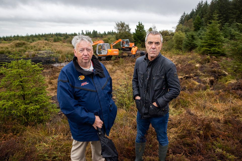 Oliver McVeigh (left ) brother of Columba McVeigh and James Nesbitt (right), patron of Wave Trauma Centre, at Bragan Bog, Co Monaghan. Liam McBurney/PA Images via Getty Images