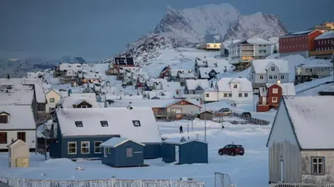Reuters A view of houses covered by snow in the Greenlandic capital, Nuuk