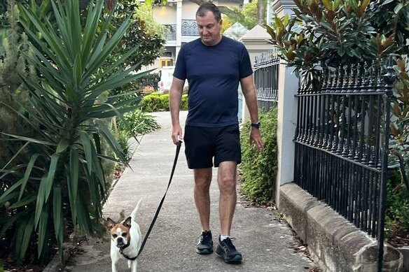 Neil Breen with his dog, Katy. “While I already did a lot of walking, I had never before counted steps.”