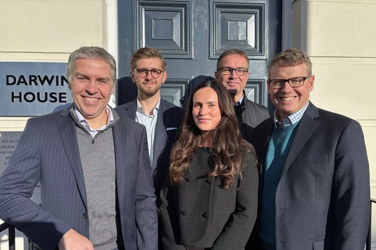 The JM Finn Cheltenham team outside their new office