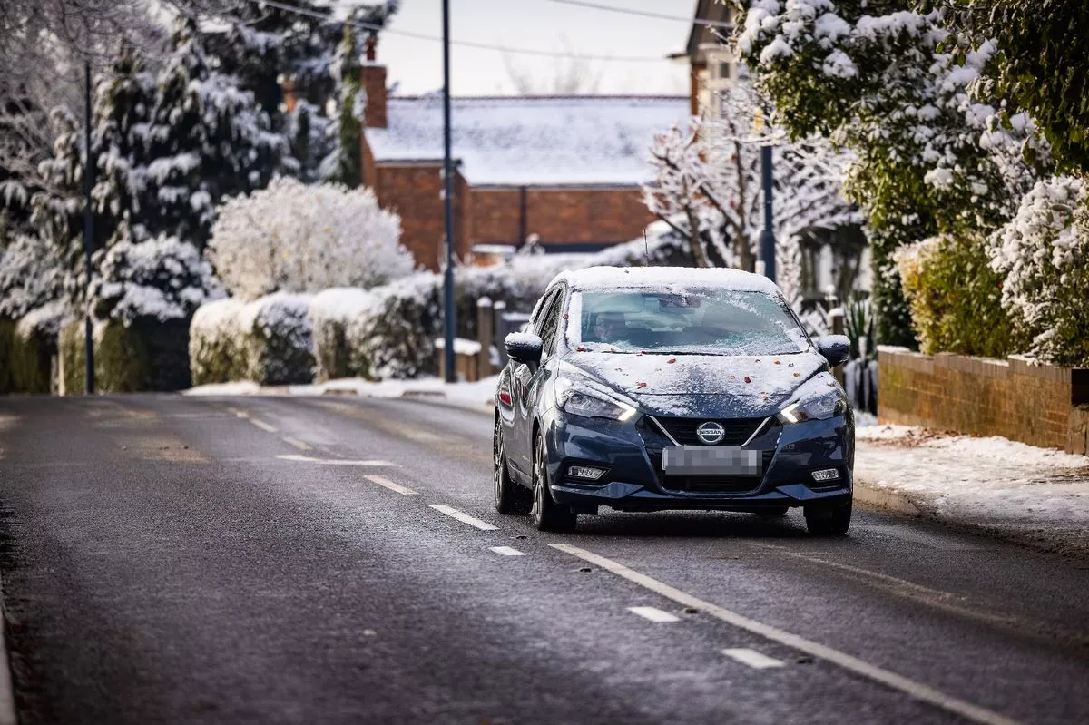 Cars Driving In Snow