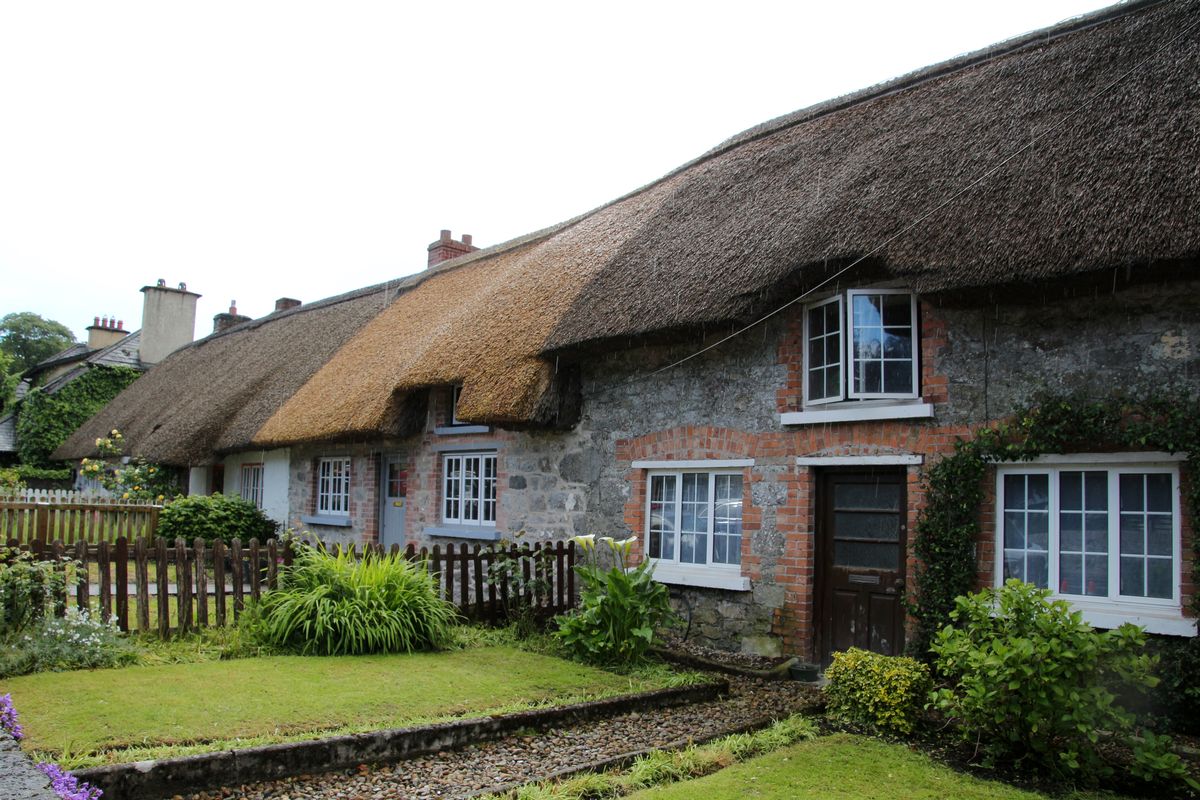 Adare, County Limerick, Ireland:-One of Adare's signature cottages on Main Street