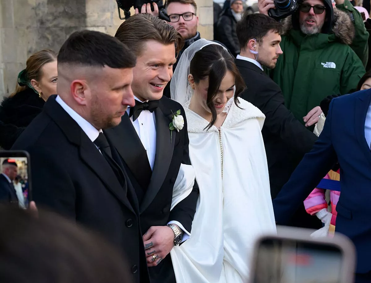 Adam Peaty and Holly Ramsay depart after their wedding at Bath Abbey on December 27, 2025 in Bath, England