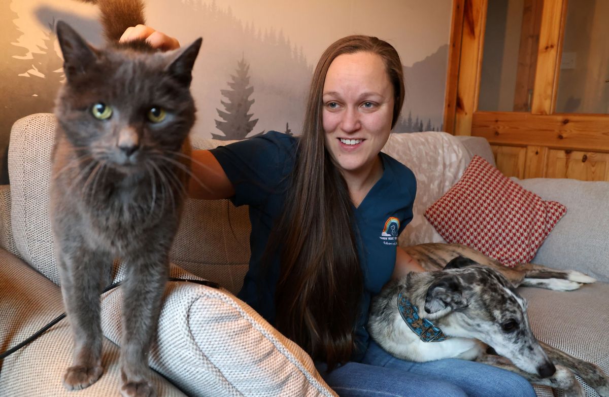 Dr. Anderson and with her cat 'Mojo' and dog' Oliver