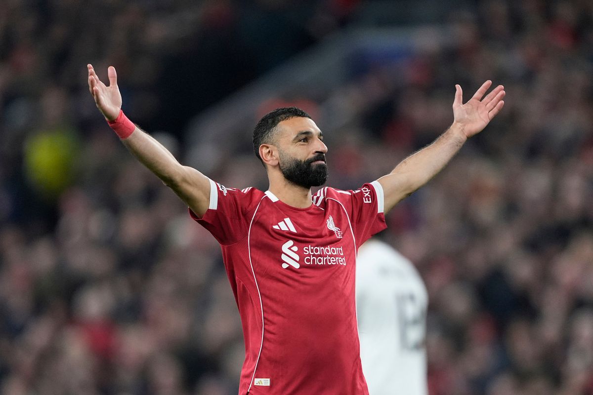 Mohamed Salah netted as Liverpool breezed into the Champions League Round of 16.