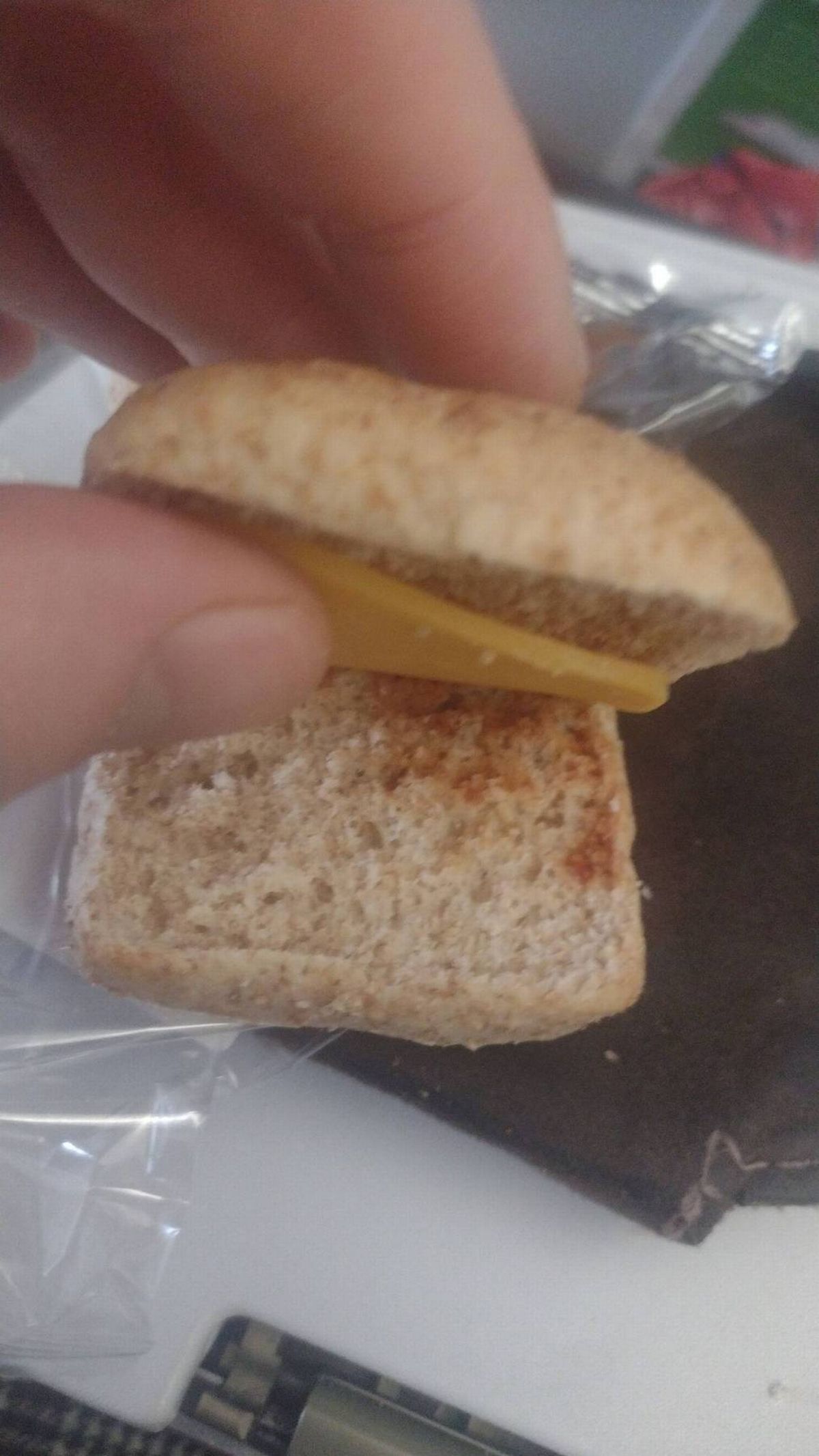 PIC FROM Kennedy News and Media (PIC SHOWS: THE SANDWICH OISÍN BREEN, 40, WAS SERVED ON A LONG-HAUL AER LINGUS FLIGHT) A plane passenger has slammed Aer Lingus after being served the 'world's worst sandwich' - that was missing half its filling and not much bigger than his THUMB. Oisín Breen was flying from Dublin, Ireland, to Toronto, Canada, last month [December 26th], before catching an onward flight to Jamaica the following day for a trip to see his fiance's family. The 40-year-old was five hours into the seven-hour Aer Lingus flight when he was served his second meal, opting for the vegetarian option of a cheese and relish sandwich. DISCLAIMER: While Kennedy News and Media uses its best endeavours to establish the copyright and authenticity of all pictures supplied, it accepts no liability for any damage, loss or legal action caused by the use of images supplied and the publication of images is solely at your discretion. SEE KENNEDY NEWS COPY - 0161 697 4266