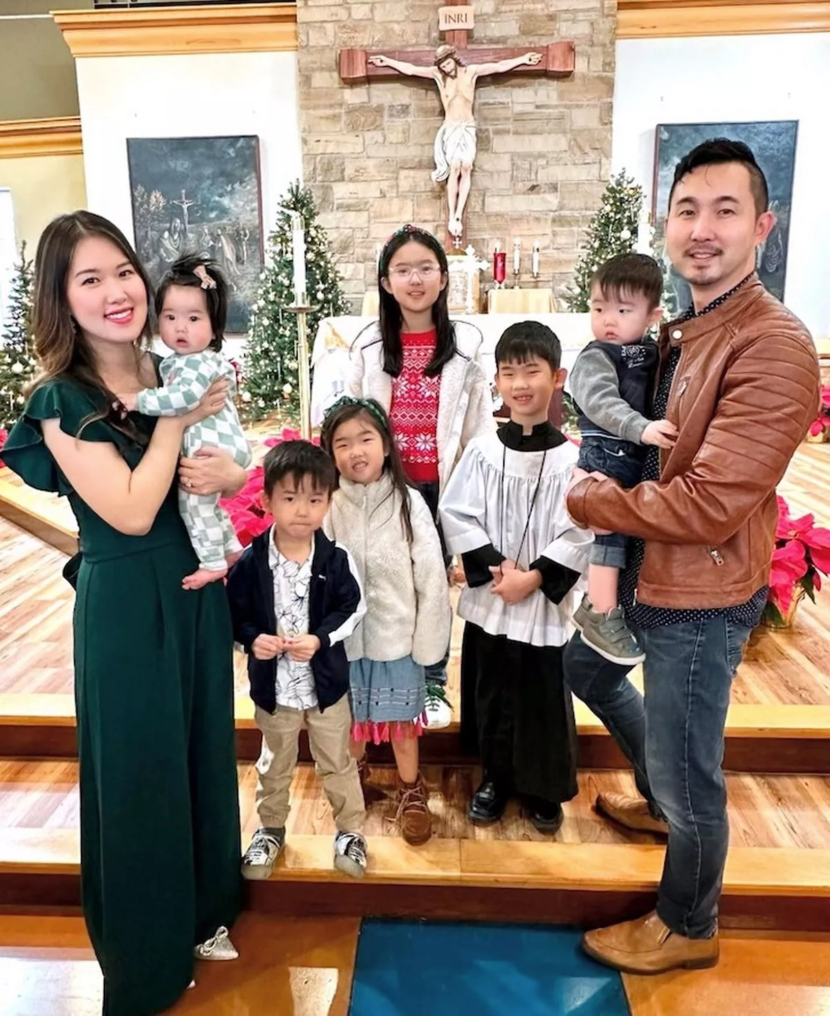 Paul Kim, right, with his family