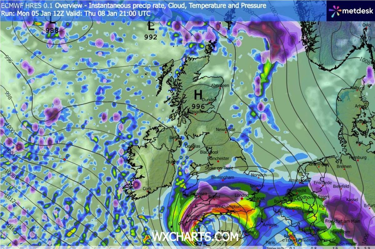 A weather map depicting a region with various weather patterns and systems, including a high-pressure area marked with the letter "H." The map uses a color-coded system to represent different weather conditions, with green, blue, and purple hues indicating varying atmospheric pressures and weather phenomena.