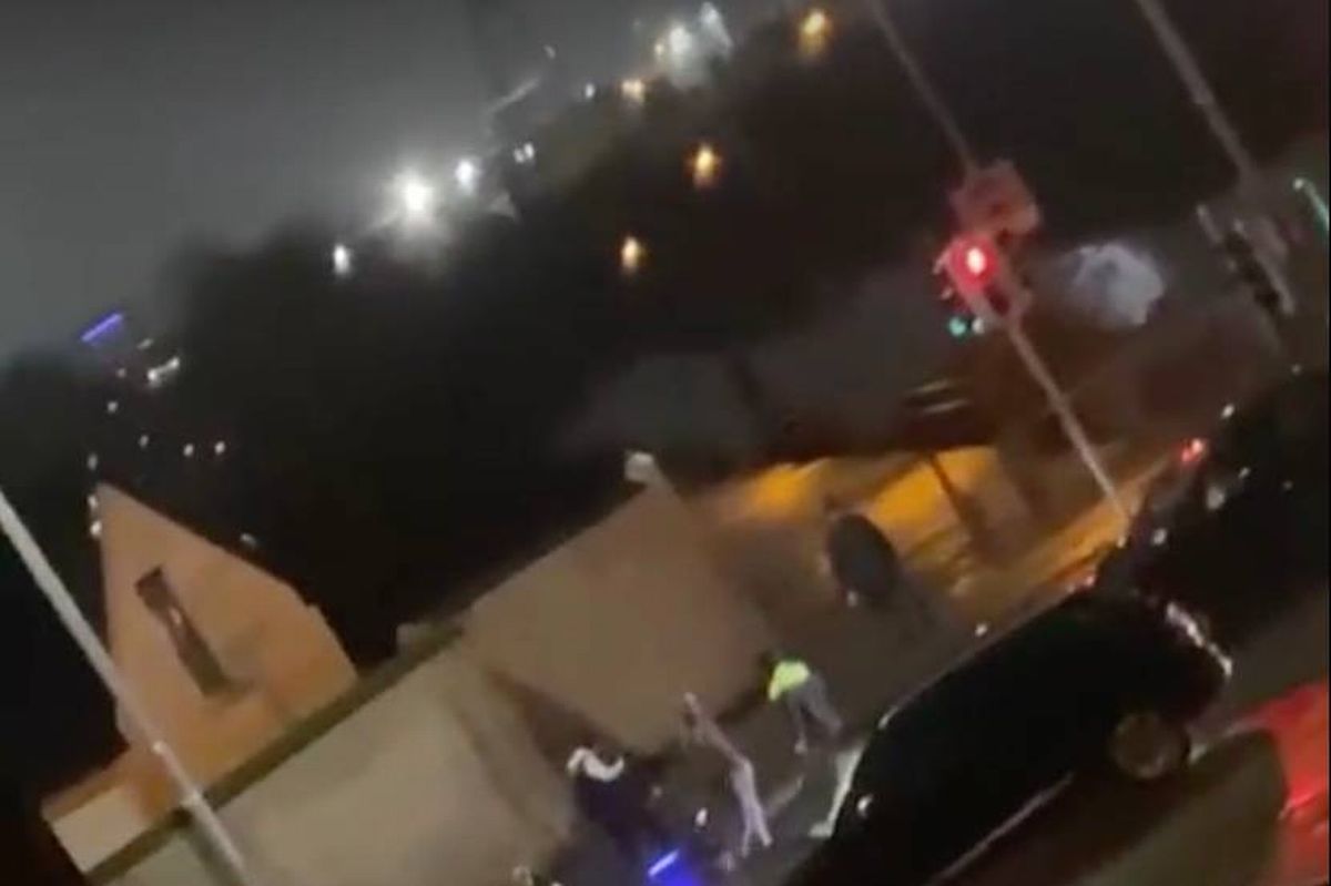 Screengrab from viral video showing gardai near the 79 Inn in Ballyfermot where a man entered the bar armed with a gun