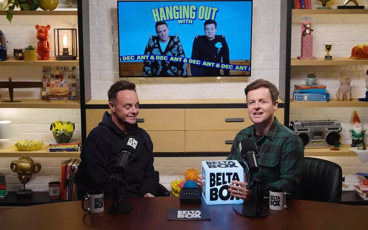 Ant and Dec sitting at a table presenting a TV show