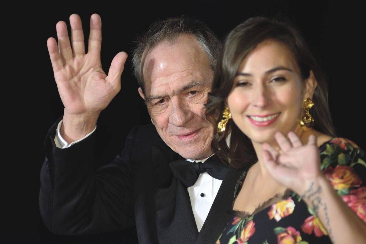 TOKYO, JAPAN - OCTOBER 25 : Actor Tommy Lee Jones (L), President of Jury of the 30th Tokyo International Film Festival and her daughter Victoria Jones (R) member of the International Competition Jury wave hands to the fans as they attends the red carpet of the festival on October 25, 2017 in Tokyo, Japan.  (Photo by David Mareuil/Anadolu Agency/Getty Images)