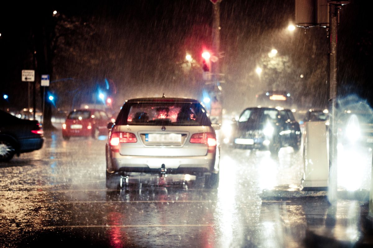 Traffic in very heavy rain at night in Dublin