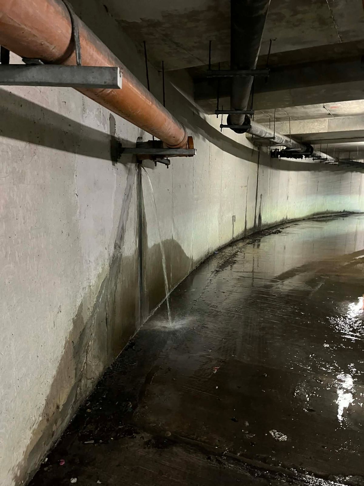 Sewage flooding and drains issue in the underground car park of Clare Village Apartments