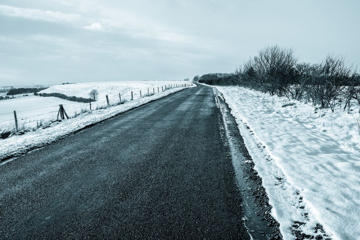 Empty country road in winter