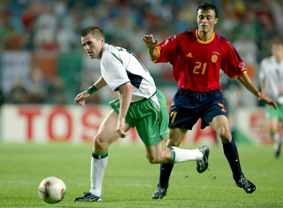 Kevin Kilbane of Ireland and Luis Enrique of Spain.