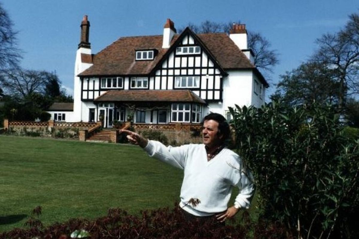 Sir Terry Wogan in the garden of his house Hitcham Close