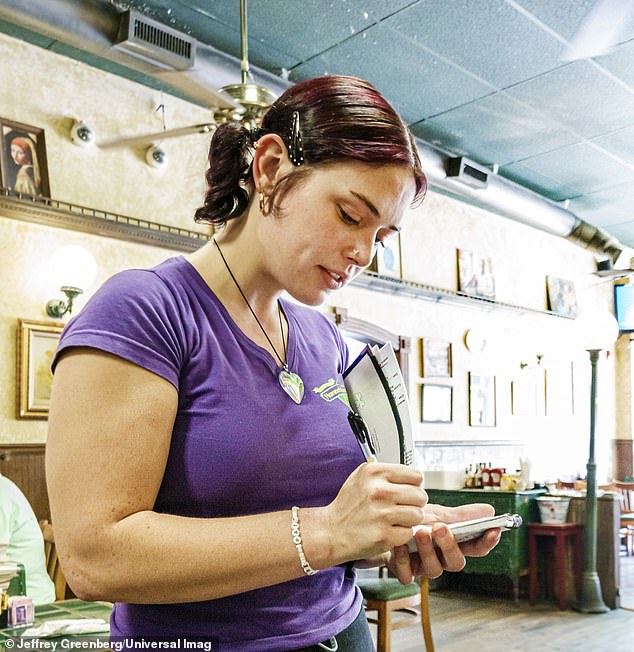 Economists tell the Daily Mail they're seeing a two-sided economy: giant, billion-dollar brands are raking in massive profits and seeing stock surges, while small businesses and local customers are feeling the pinch