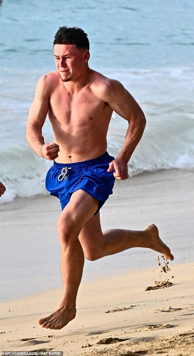 Wayne Rooney's lookalike son Kai showed he's following in his dad's footsteps as he took a break from Manchester United's under-18s for a family holiday to Barbados