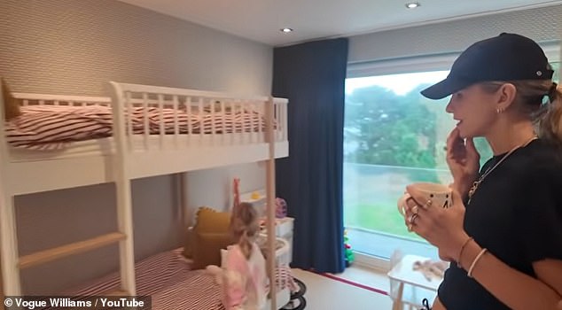 Their two sons Theo, seven, and Otto, three, had a 'danger keep out' sign on their room, which had a bunkbed, toy kitchen and en-suite