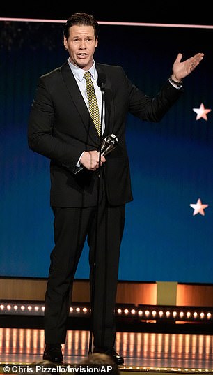 Barinholtz proudly accepting his honor