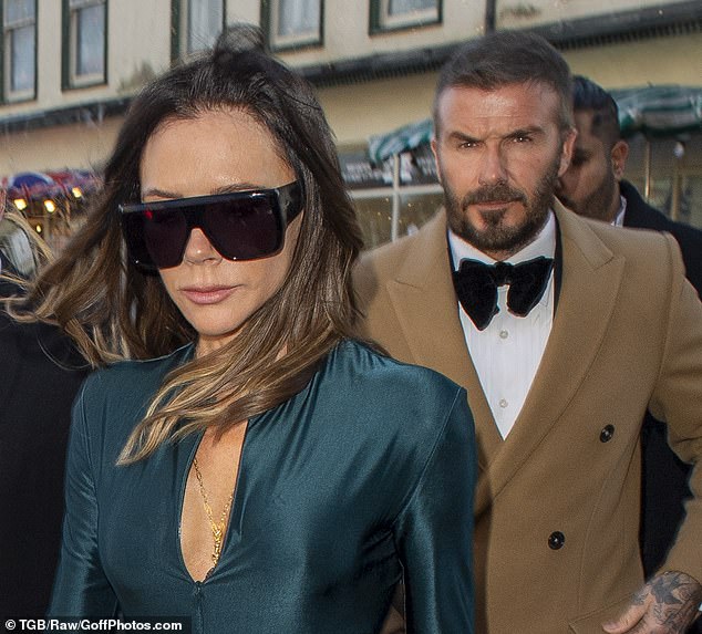 The Beckhams watched on as Adam Peaty made a vow to 'always choose' his wife Holly Ramsay in his wedding speech, amid his war with his family (David and Victoria pictured at last month's wedding)