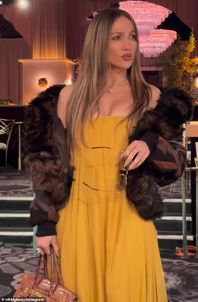 The comedian then penned in the caption: 'Tomorrow I host the Globes. Jennifer Lopez presents. Finally, we debut our duo: Nennifer' - a slight change to Bennifer