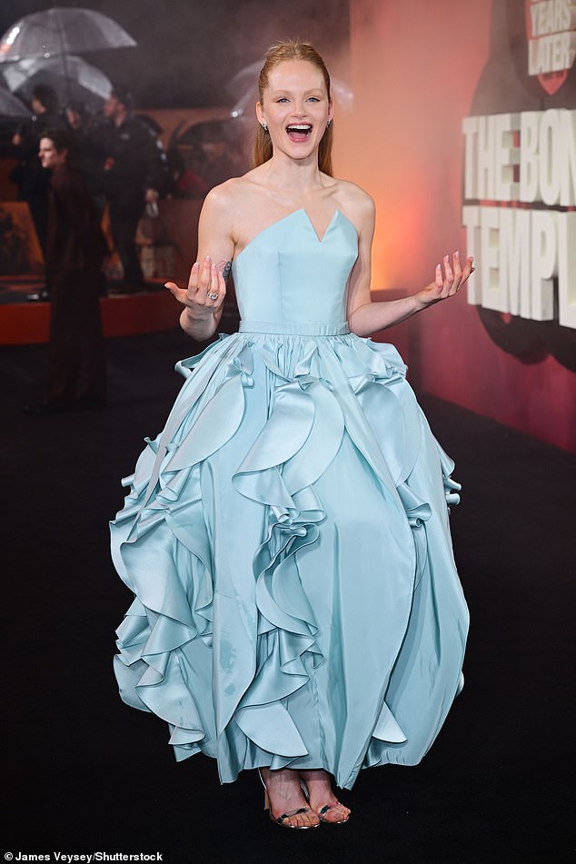 As stars battled the wet weather at the premiere, Emma was in high spirits despite the rain