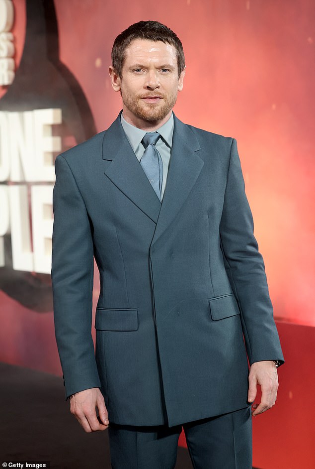 The actor cut a suave figure in a sharp blue suit as he joined his co-stars on the black carpet