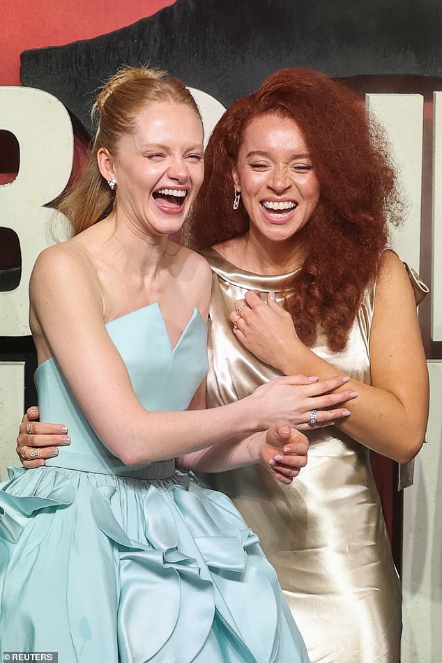 Erin and Emma struggled to contain their laughter as they arrived for the red carpet together