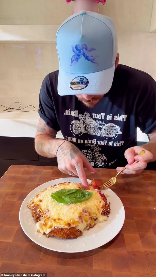 Sporting a hat to promote his hot sauce brand Cloud23, Brooklyn shared the steps he took to create the dish