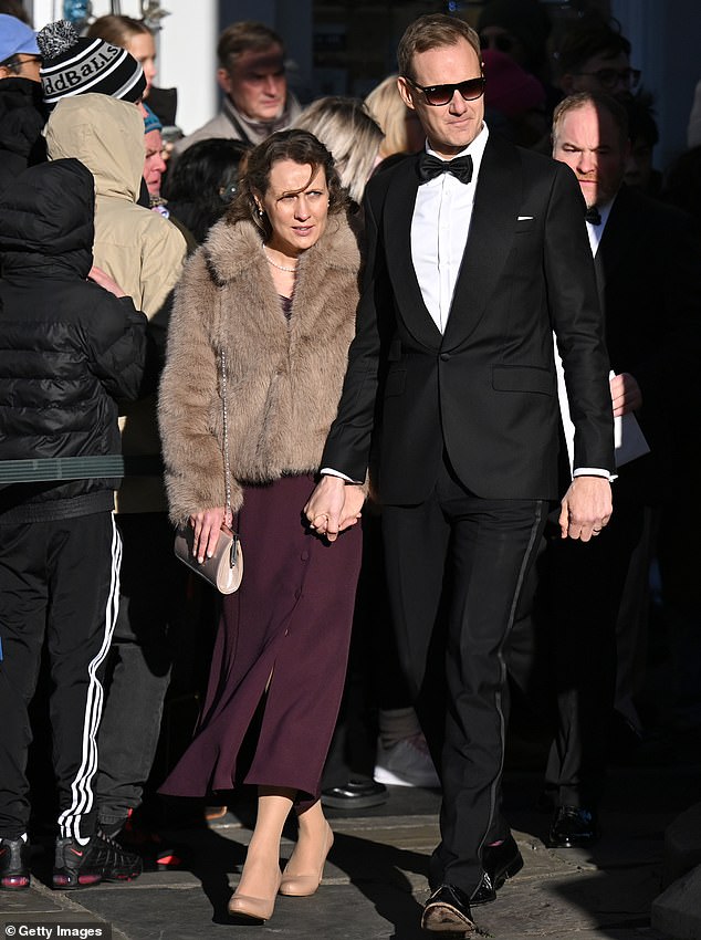 Dan with his wife, Sarah, pictured last month at Adam Peaty and Holly Ramsay's wedding in Bath
