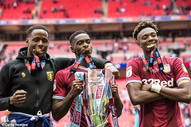 Abraham (right) played a massive role in Villa's promotion through the play-offs in 2019, scoring 25 goals in the Championship while on loan from Chelsea