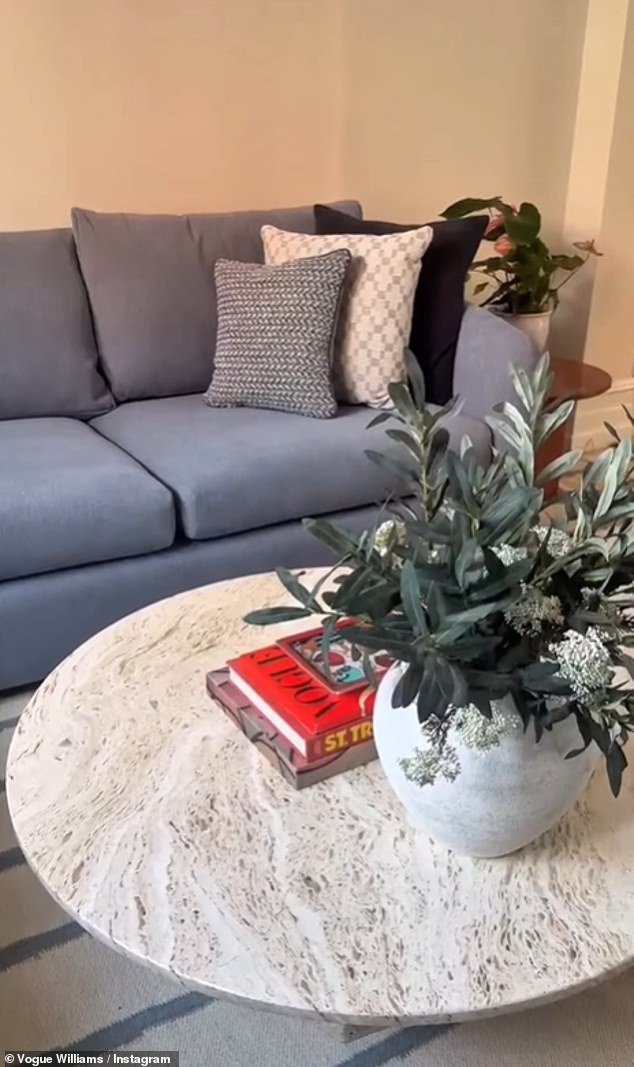 The Irish star added a large white and blue striped rug over the wooden floor and opted for a round coffee table in the centre of the room