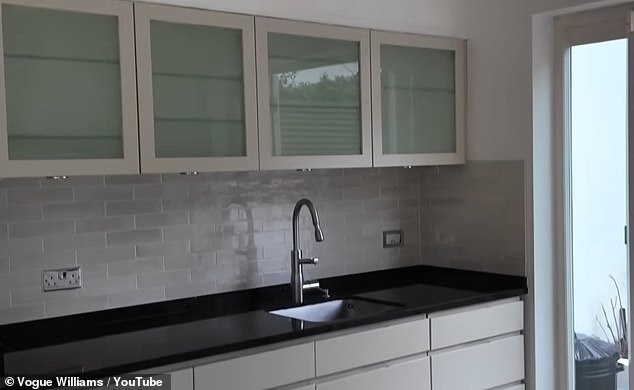 Vogue gave a glimpse of her white kitchen in the video