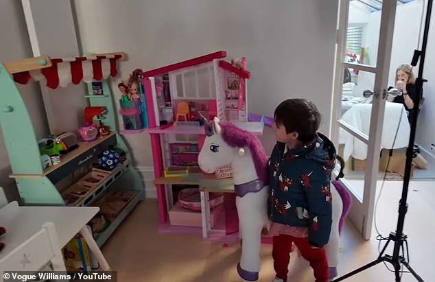 The other side of the room Vogue has tucked away her three children's toys including a dolls house and a small desk