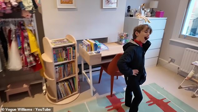 Making the most of the room, Vogue added a small desk, a book case and rails with the pairs clothes on
